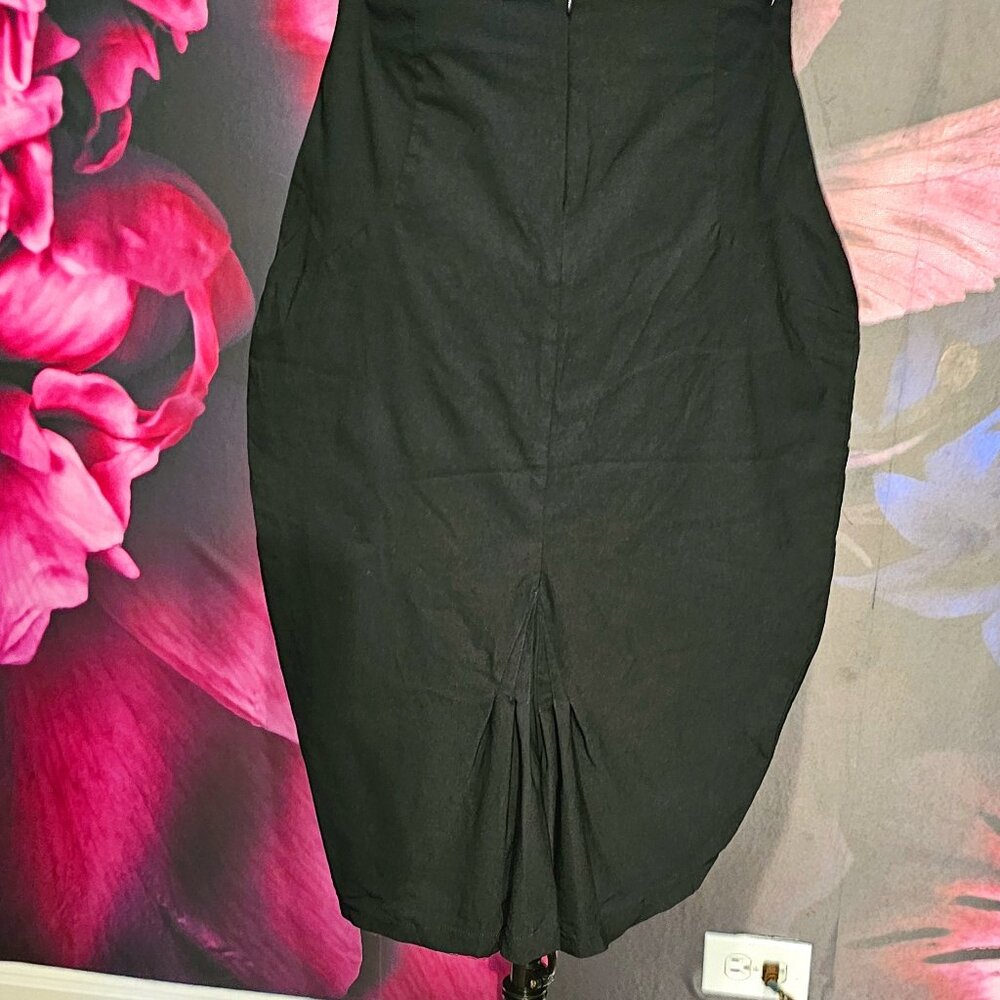 Unique Vintage back please wiggle skirt